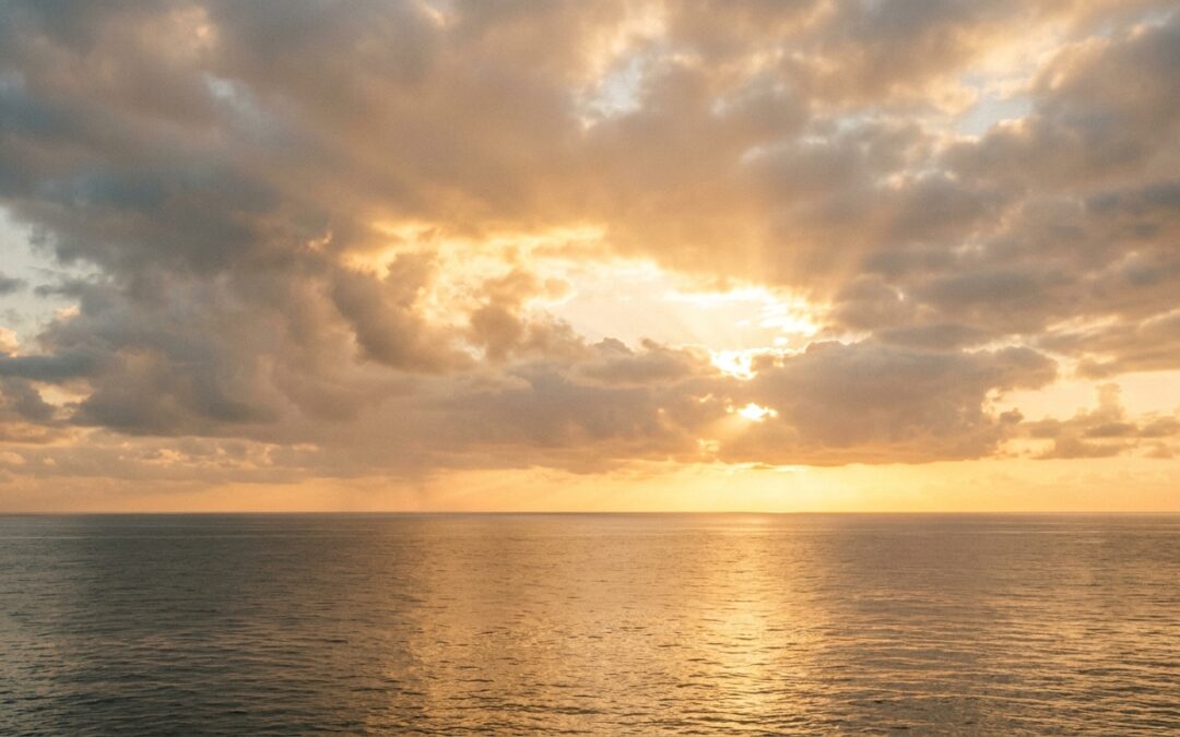 What is a miracle - golden sunrise over calm ocean representing a shift in perception